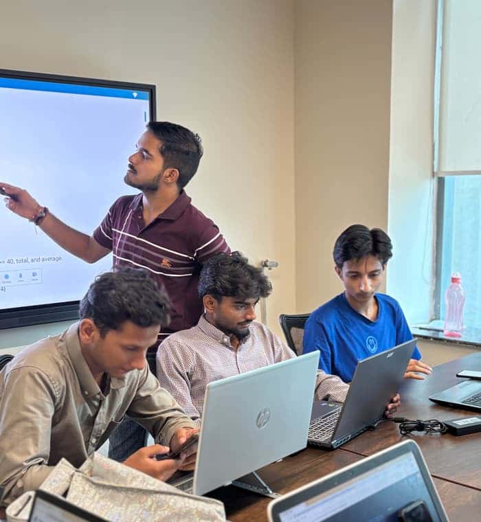 Trainer explaining a Python exercise on the screen at Aiinfox Academy, Mohali